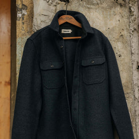 editorial image of The Connor Overshirt in Dark Navy Boucle hanging, Wovens by Taylor Stitch