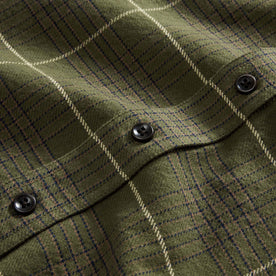 material shot of the buttons on The Ledge Shirt in Olive Plaid, Wovens by Taylor Stitch