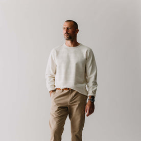 fit model with his hand in his pocket wearing The Morgan Crewneck in Natural Slub Stripe, Knits by Taylor Stitch