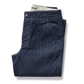 folded flatlay of The Morse Pant in Rinsed Indigo Herringbone, Bottoms by Taylor Stitch