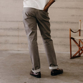 fit model showing off the back of The Morse Pant in Soil Herringbone, Bottoms by Taylor Stitch