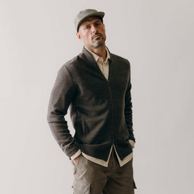 fit model with his hands in his pockets wearing The Portola Bomber in Heather Loden Merino, Knits by Taylor Stitch