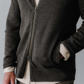 fit model showing off pockets on The Portola Bomber in Heather Loden Merino, Knits by Taylor Stitch