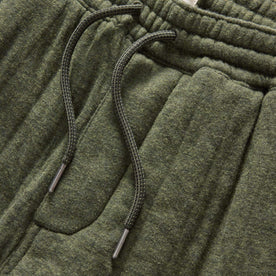 material shot of the waistband on The Quilted Apres Pant in Heather Fatigue Olive Jersey, Bottoms by Taylor Stitch