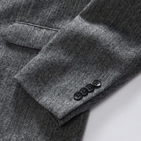 material shot of the side buttons on The Stevens Sportcoat in Slate Herringbone Wool, Outerwear by Taylor Stitch