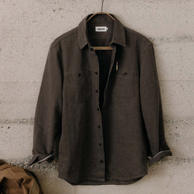 editorial image of The Utility Shirt in Soil Selvedge Denim hanging, Wovens by Taylor Stitch