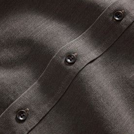 material shot of the buttons on The Utility Shirt in Soil Selvedge Denim, Wovens by Taylor Stitch