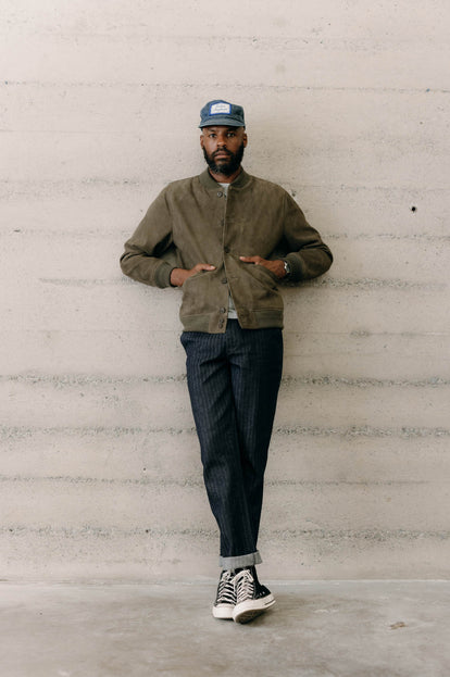 Model wearing The Bomber Jacket in Army Suede and The Morse Pant