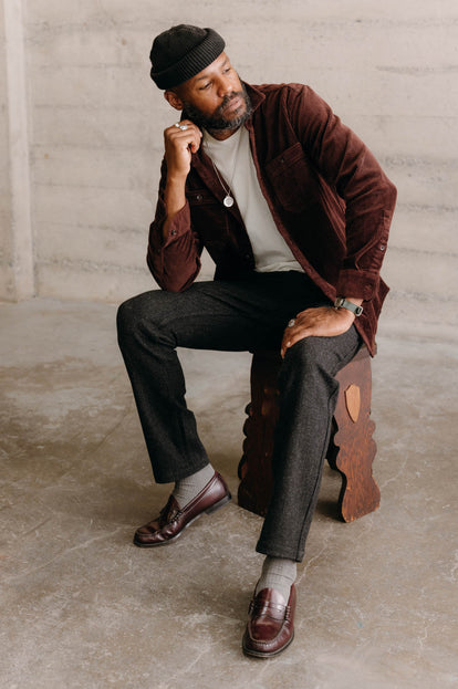 Model wearing The Utility Shirt in Burgundy and The Carnegie Pant in Charcoal