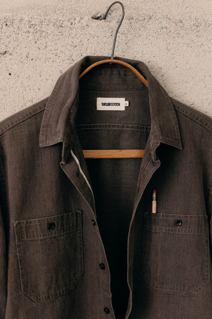 Close up of The Utility Shirt in Soil Selvedge Denim, with a pencil in the chest pocket