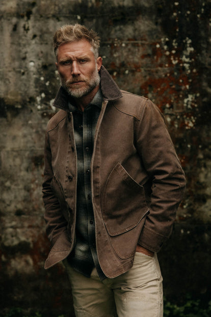 Model wearing The Upland Jacket in Aged Penny Chipped Canvas over The Maritime Shirt Jacket