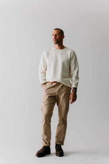 Model wearing The Morgan Crewneck with The Democratic Foundation Pant